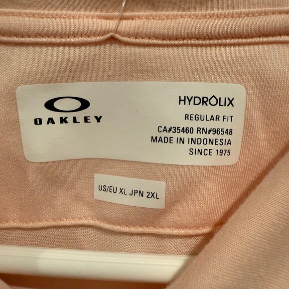 Oakley Men's XL Polo Shirt Pastel Orange Sand Print Hydrolix NWT Golf Top - Picture 5 of 6